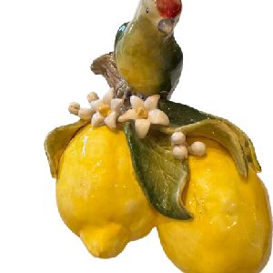 ENFEITE PENCA LIMOES C PASSARO 15X18X21CM